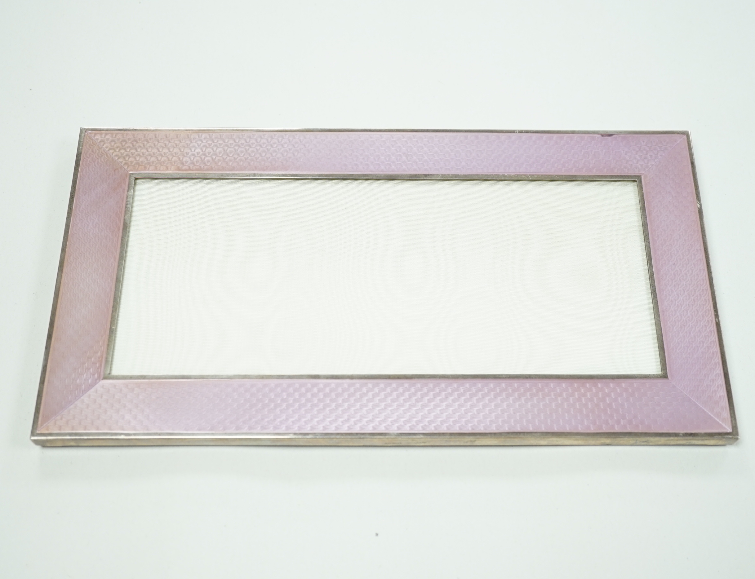 A modern Italian Hamilton 925 and pink guilloche enamel mounted rectangular photograph frame, 30cm.